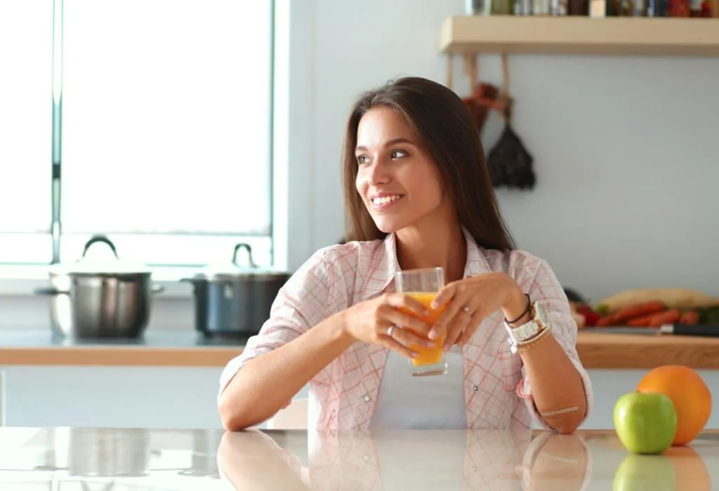 Lady drinking juice and relaxing