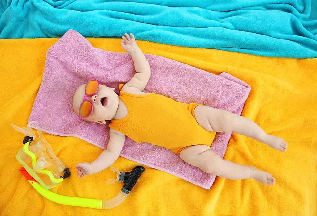 Baby sleeping in beach/scuba props Baby sleeping in beach/scuba props