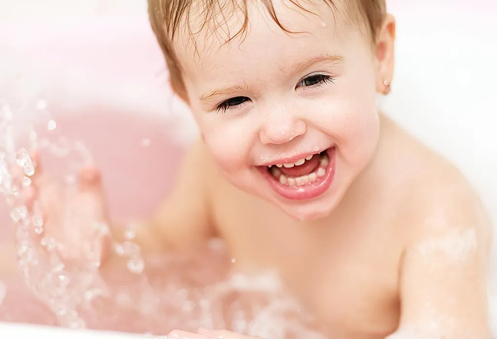 Baby playing in the bathtub Baby playing in the bathtub