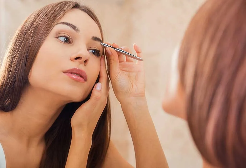 tweezing brows