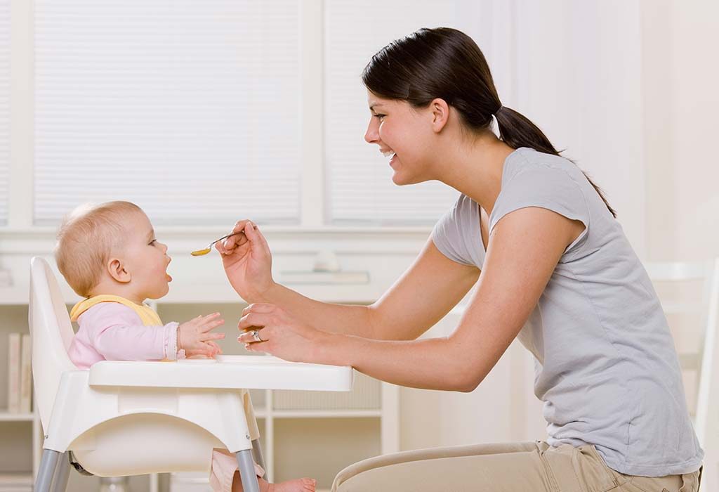 bottle feeding in high chair