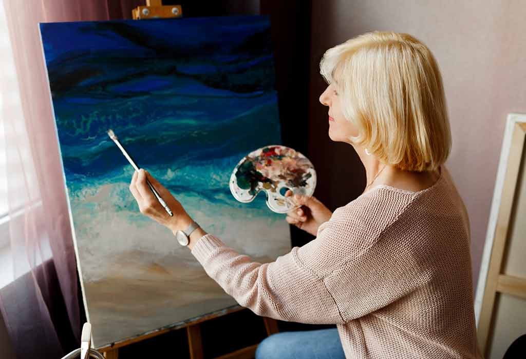 mother painting an ocean