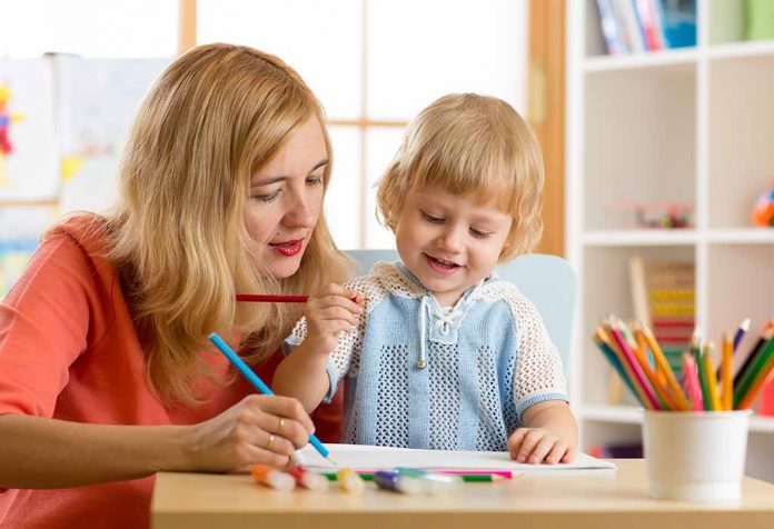 mom colouring with toddler