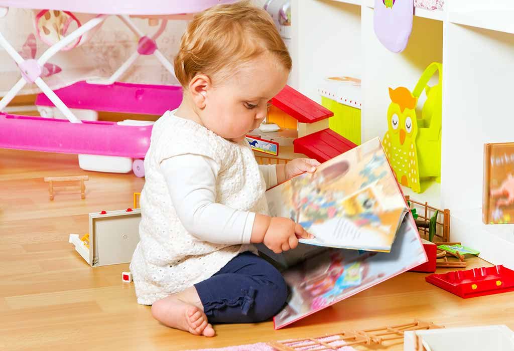 baby reading a book