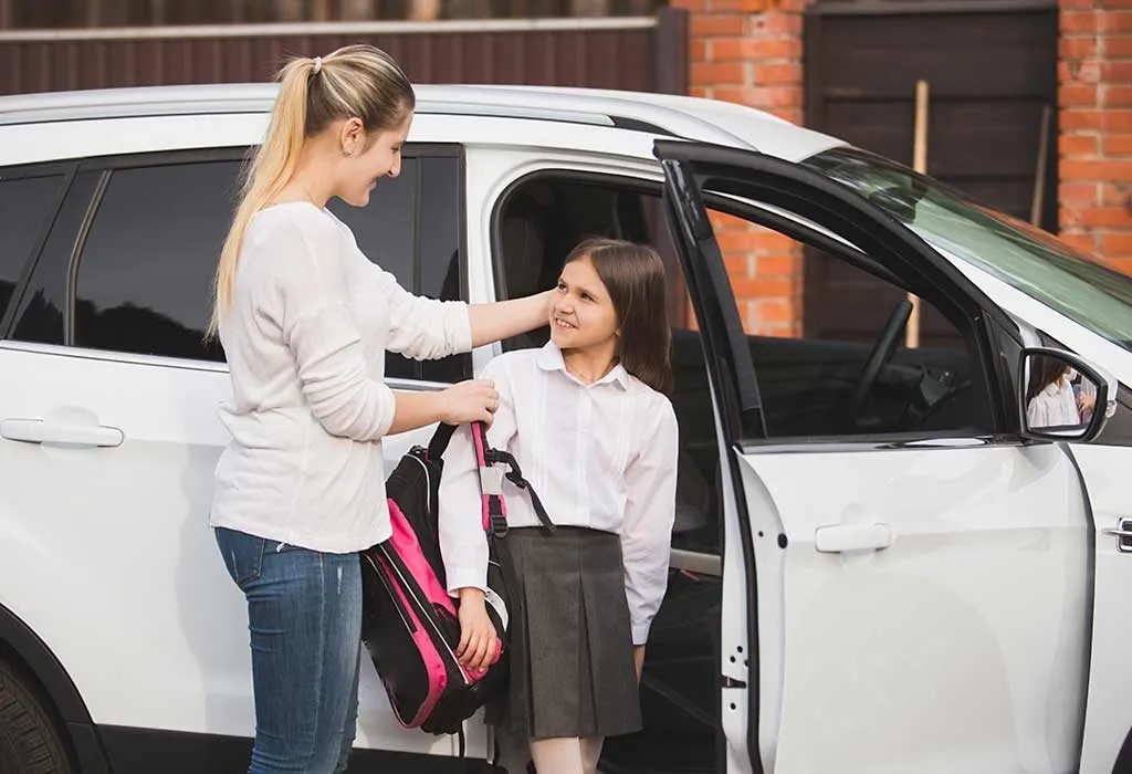 A nanny dropping a girl at school