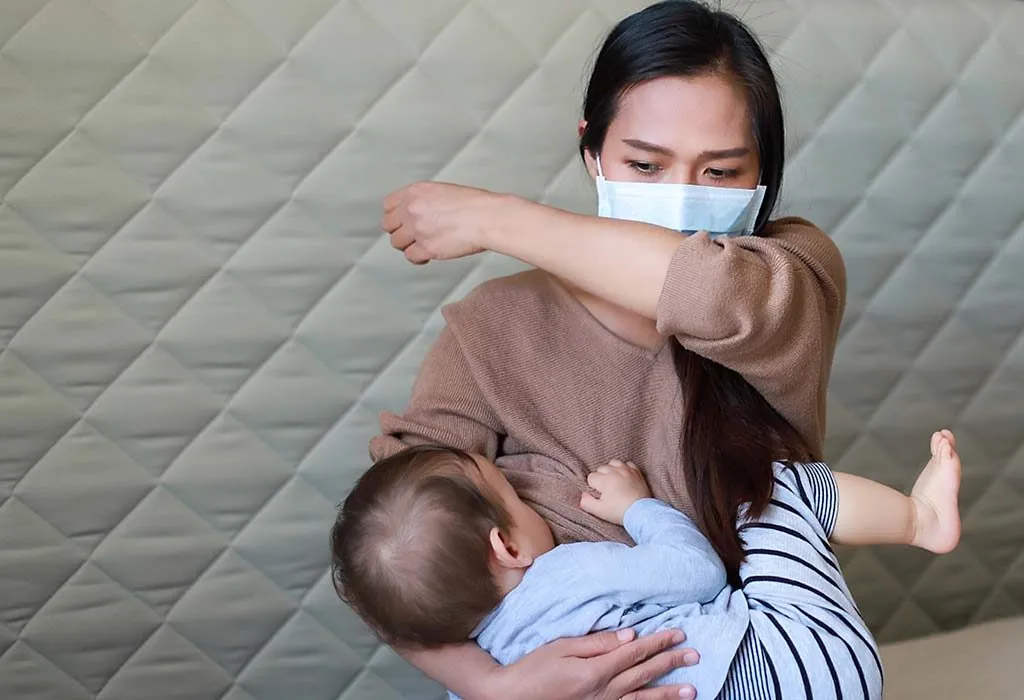 mother breastfeeding her child