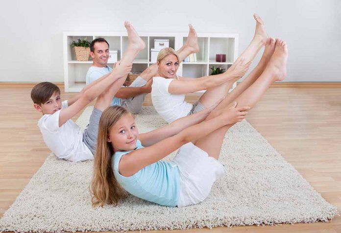 family doing yoga together