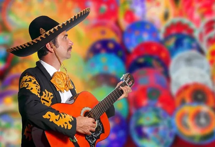 Mexican guitarist representing Mexican culture