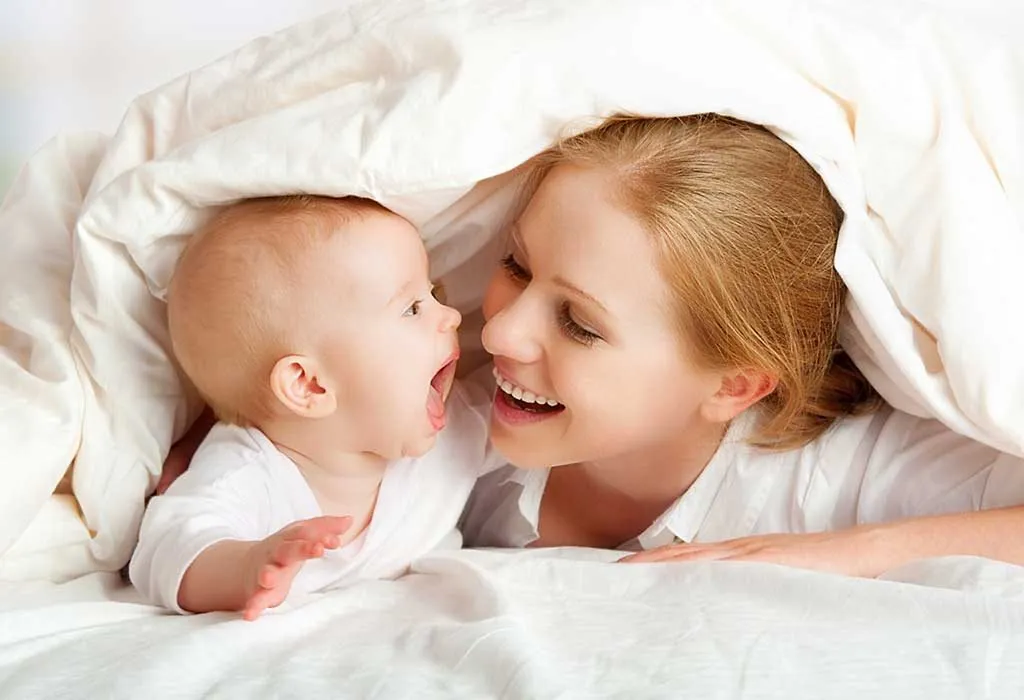 Mother and baby playing 
