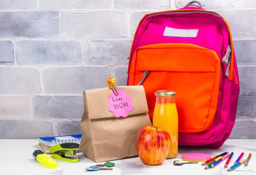 school bag and lunch box with a note
