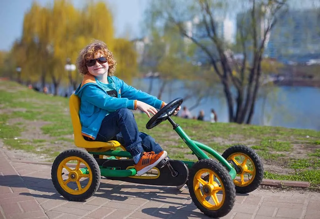 kid riding a quad bike