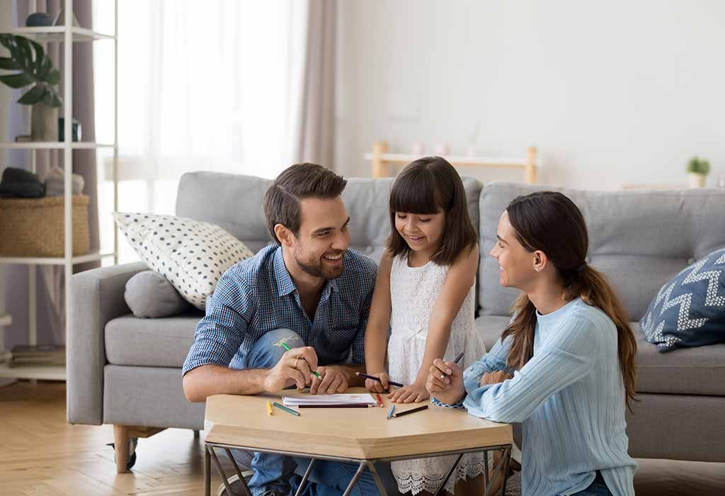 girl learning at home with family