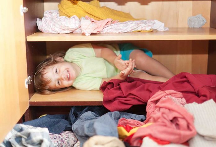 mischievious kid hiding in a closet