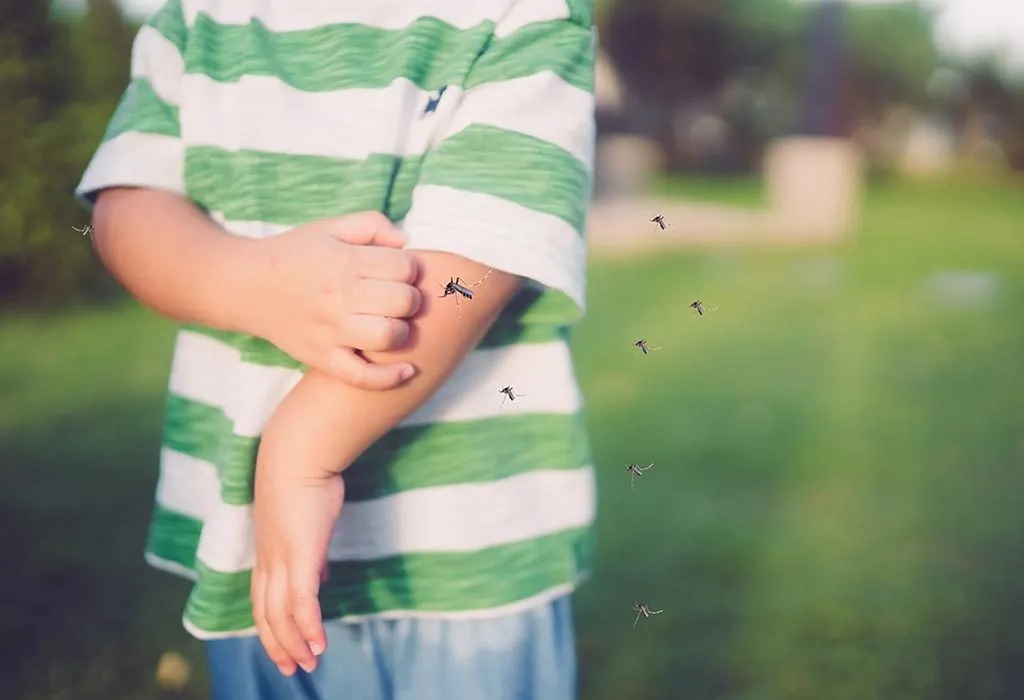 boy outdoors with mosquito patch