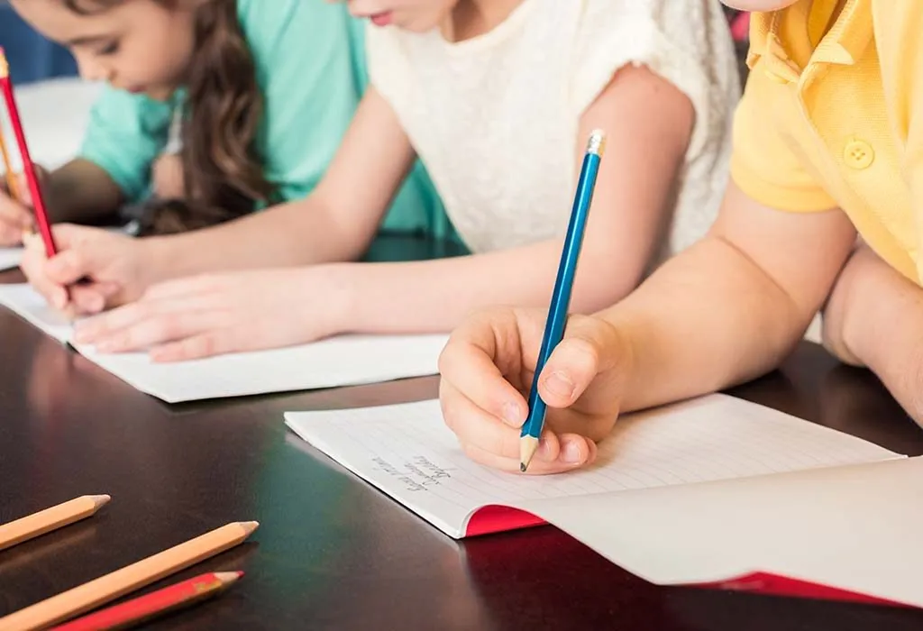 kids taking an exam in school