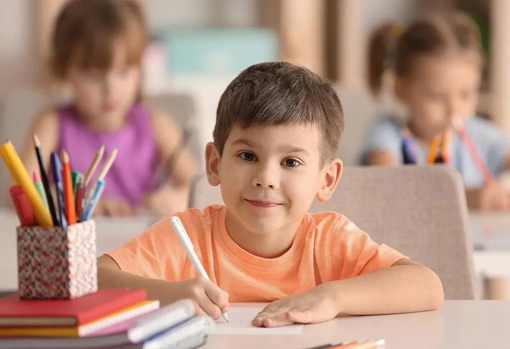boy sitting in classroom