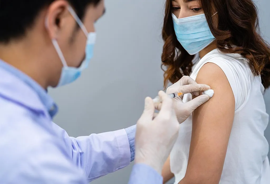 A woman getting vaccinated against COVID-19