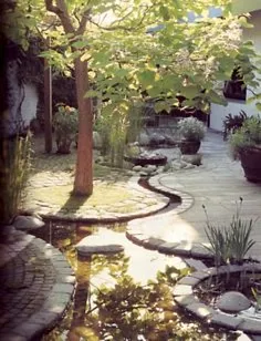 Water Feature Amidst a Flower Garden