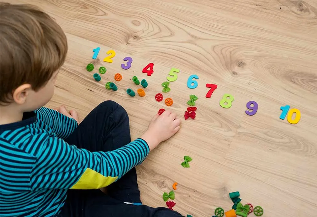 Child playing with numbers