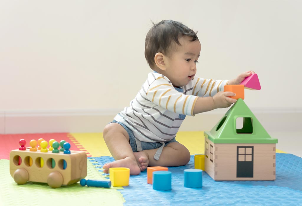 Baby Boy Playing With Toys
