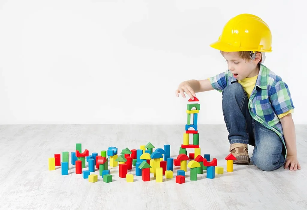 Kid Playing With Building Blocks