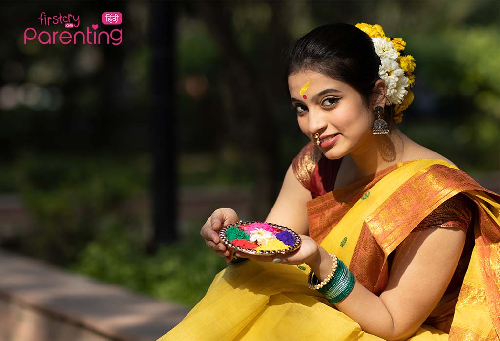 पीला रंग के वस्त्र में भारतीय महिला