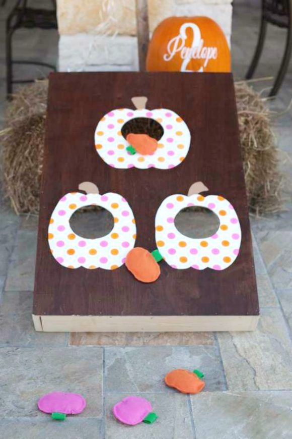 Cornhole Game with Pumpkins