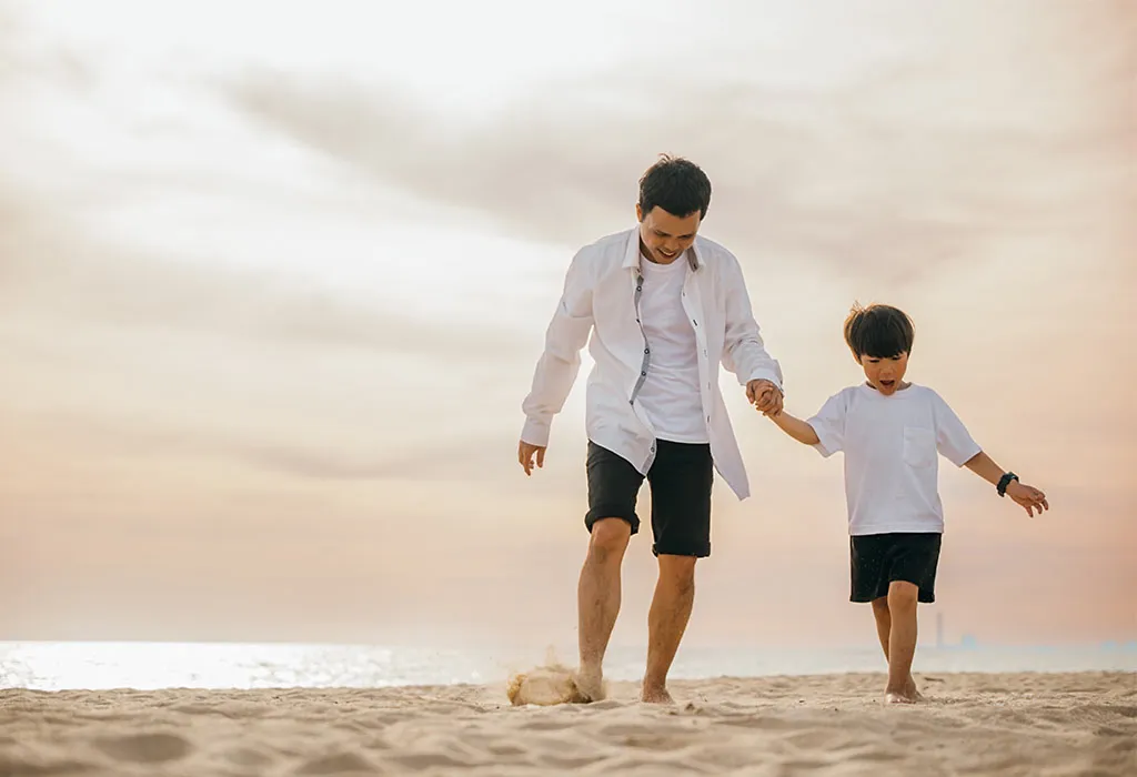 Father and Child Walking Hand in Hand