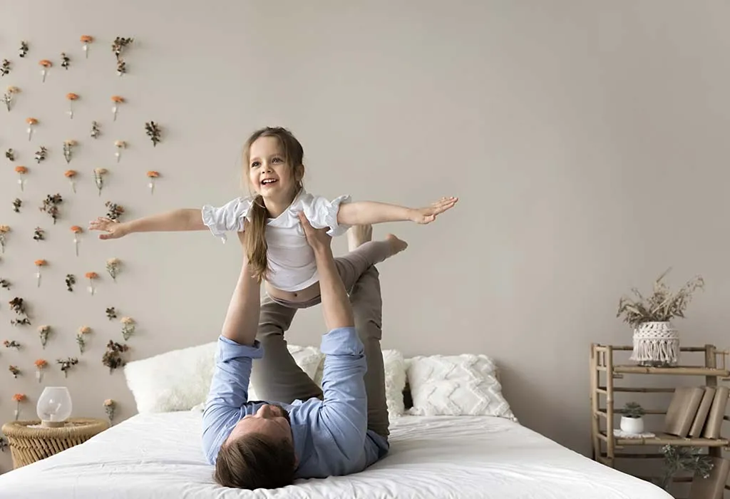 Dad Lifting Kids in the Air