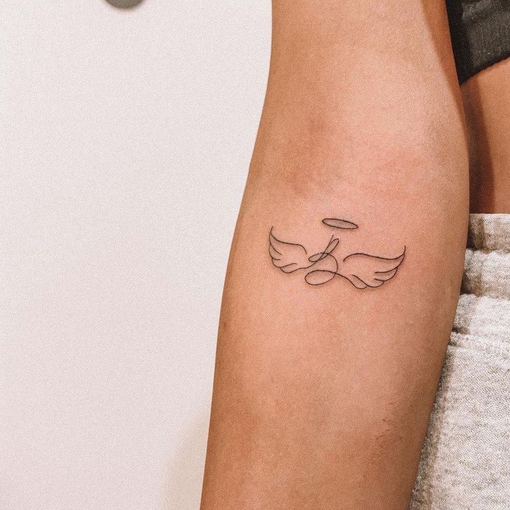 Baby’s Initial with Wings tattoo
