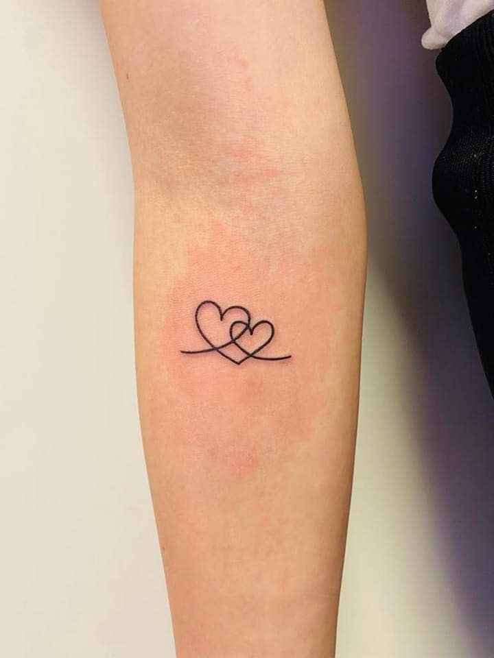 Two Intertwined Hearts tattoo