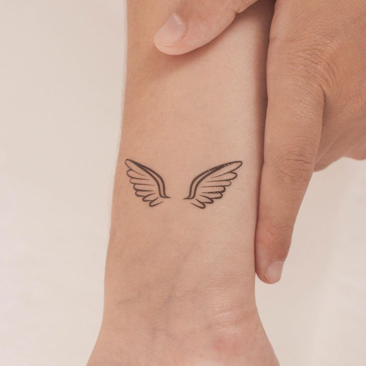 Paired Angel Wings tattoo
