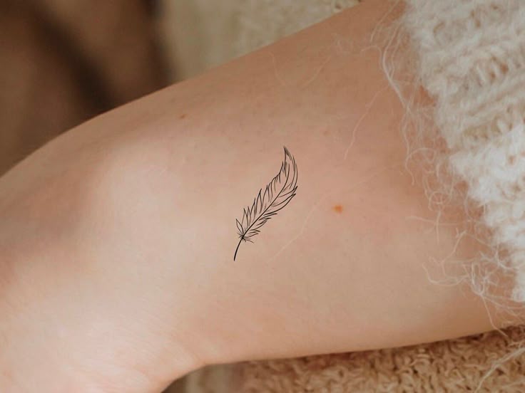 Small Feather tattoo