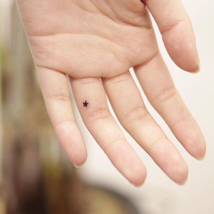 tiny Single Star tattoo