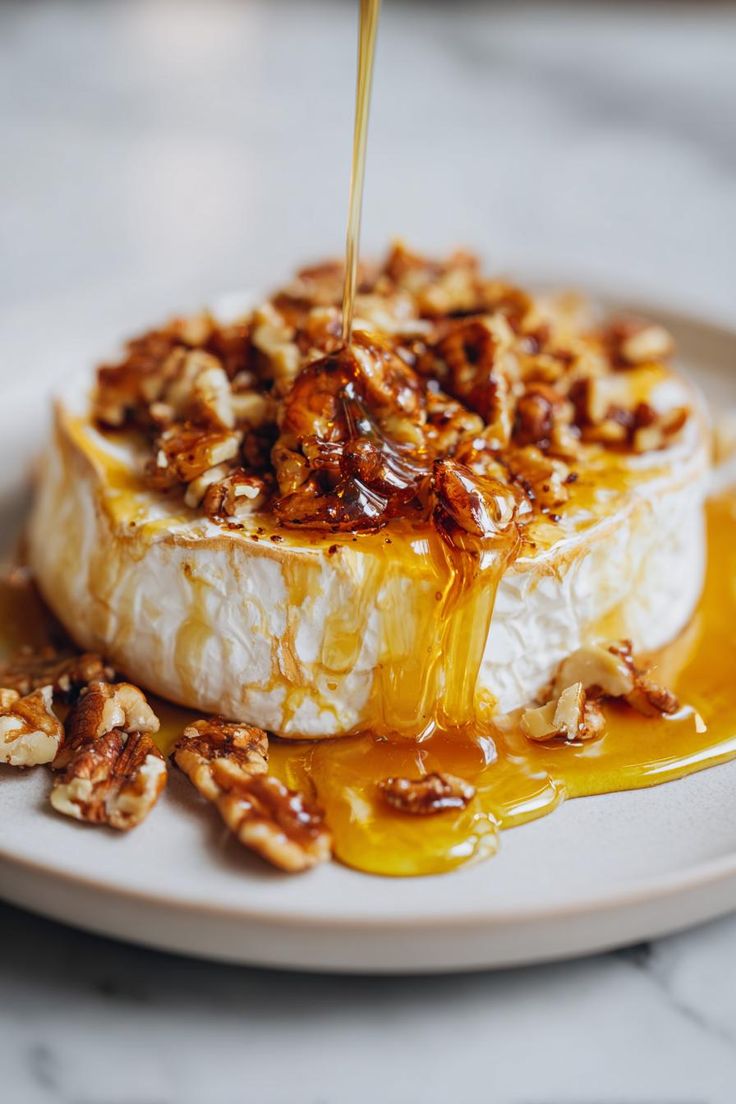 Glazed Brie Cheese With Sugar and Nuts Glazed Brie Cheese With Sugar and Nuts