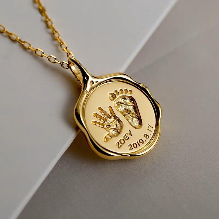 Fingerprint or footprint pendant