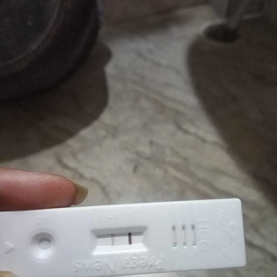Can Any One Help Me I Missed My Periods I Checked 2 Times Home Pregnancy Test By Kit But 1 Line Showing Dark Pink 2 Line Showing Light Pink If